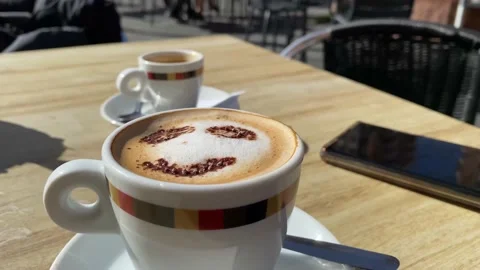 Coffee with drawn smiley face concept morning happiness cappuccino Stock Footage 236123778