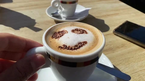 Coffee with drawn smiley face concept morning happiness cappuccino Stock Footage 236123785