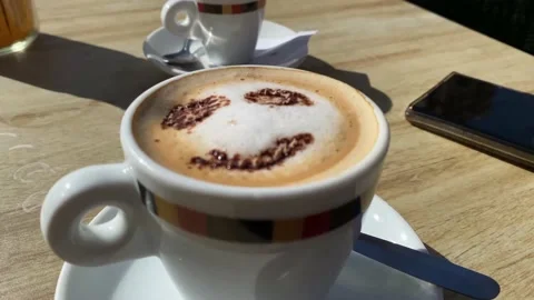 Coffee with drawn smiley face concept morning happiness cappuccino Stock Footage 236123790