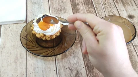 Coffee drinking with a basket, a sample of cupcake cream Stock Footage 199019513