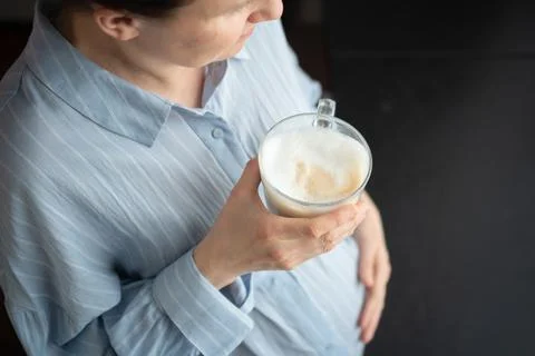 Coffee drinking during pregnancy Stock Photos