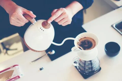 Coffee drip, coffee filter process, vintage filter image Stock Photos