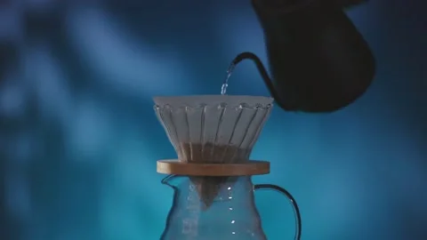 Coffee Drip Concept. Pouring Hot Water from Kettle into a Dripper. Making Hot Stock Footage 132568873