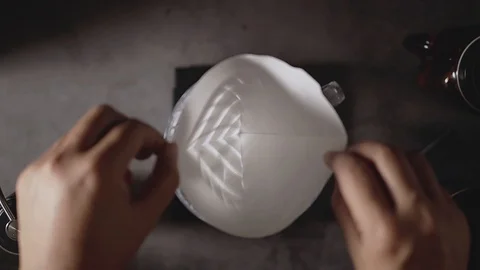 Coffee Drip Concept. Shot of Preparing Paper Filter to Making Hot Coffee Drin Stock Footage 130048112