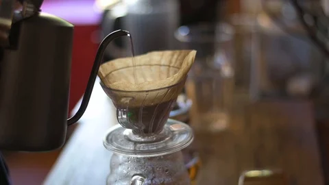 Coffee drip process by pouring hot water Stock Footage 128788951