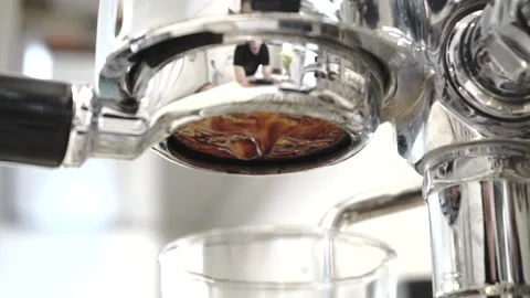 Coffee dripping from a coffee machine Stock Footage 133138927