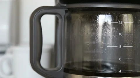 Coffee dripping from machine Stock-Footage 37779336