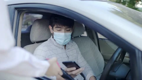 Coffee on a drive thru during the COVID-19 outbreak. Stock Footage 146158306