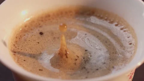 Coffee drop into the  Cup from the coffee machine, Last drop of coffee drink Stock Footage 199473771