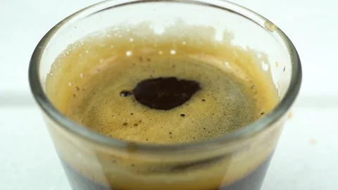 Coffee Drop Falling into Coffee, Slow Motion Stock Footage 108257779