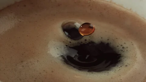 Coffee Drop in Mug: Super Slow-Mo 1000fps 스톡 동영상 251873824