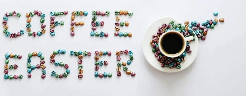 Coffee Easter. Lettering made of multi-colored pearl coffee beans on white Stock Photos