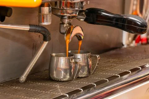 Coffee extraction from professional coffee machine Stock Photos