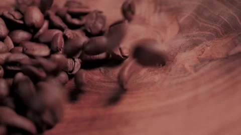 Coffee. Falling Fragrant roasted coffee beans on background. Stock Footage 150169146