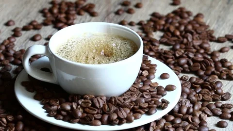 The coffee is filling the cup Stock Footage 76536351