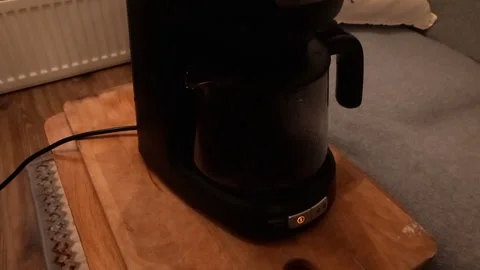 Coffee Filter Brewing with Water Siphon and Heating Hiss -- Close-up on Steaming Stock Footage 336946303
