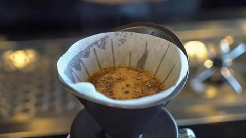Coffee filter with ground coffee ready for brewing Stock Photos