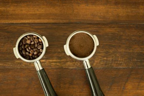 Coffee filter holders for coffee machine with beans and coffee ground Stock Photos