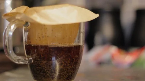 Coffee Filter Splitting in Cup Stock Footage 85994519