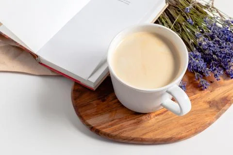 Coffee with flowers composition on the table Stock Photos