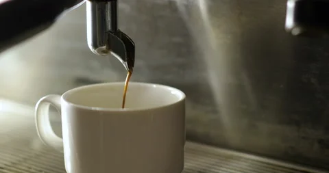 Coffee flows from cofee machine. The process of making coffee. Stock Footage 88823508