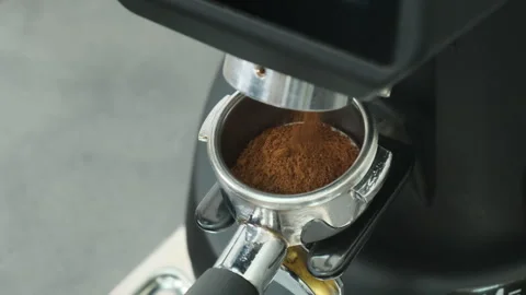 Coffee flows from upper part of coffee machine into portafilter Video stock 306618159