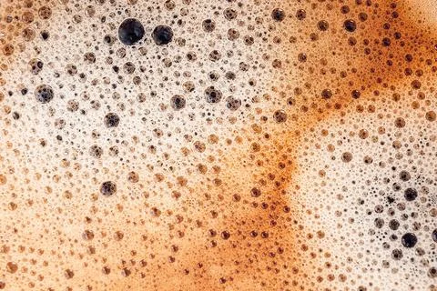Coffee foam close up. Macro texture and background Stock Photos