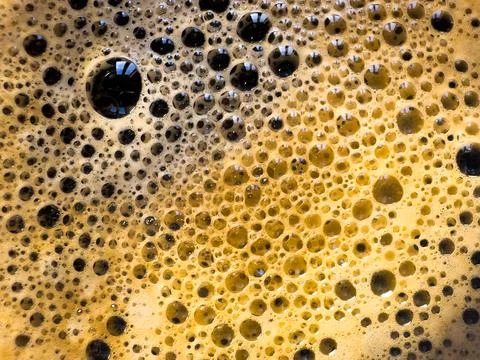 Coffee foam extreme close-up texture background Stock Photos