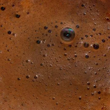 Coffee Foam Texture in Daylight 스톡 사진