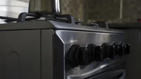 Coffee in a geyser coffee maker is brewed on a gas stove. HLG REC2020 Stock Footage 229073481