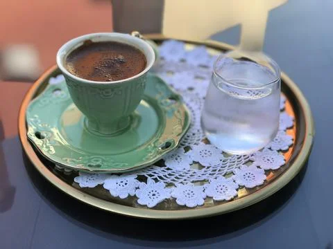 Coffee is on the glass table Stock Photos