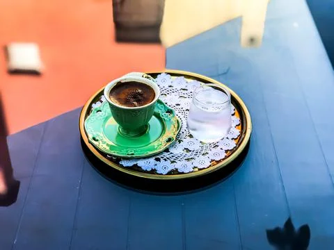 Coffee on the glass table Stock Photos