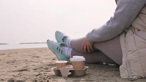 Coffee to go. Coffee break in an open space. Morning coffee on the seashore by Video stock 188714038