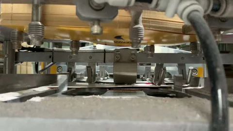 Coffee-to-go cup production on a machine. Stock Footage 155516484