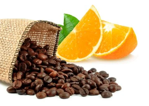 Coffee grains and orange Stock Photos