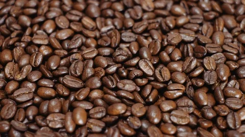 Coffee grains background. Coffee beans for espresso. Black coffee texture. Stock Footage 112682168