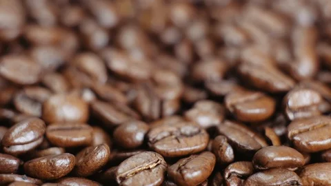 Coffee grains background. Coffee beans for espresso. Black coffee texture. Stock Footage 112682417