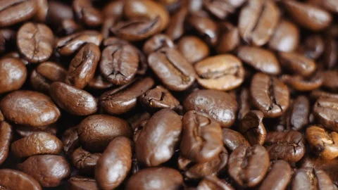 Coffee grains background. Preparing fresh roasted coffee beans for espresso. Stock Footage 112682281