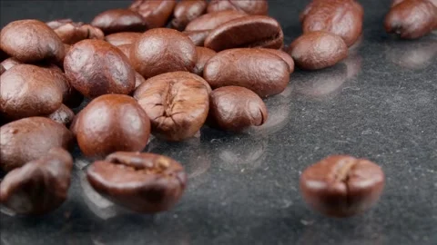 Coffee grains close-up on a gray background. 動画素材 139487004