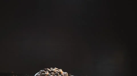 Coffee Grains Falling In White Cup. 4K Stock Footage 68632854