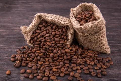 Coffee grains in sacks 스톡 사진