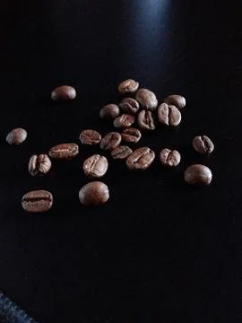 Coffee grains on the table Stock Photos