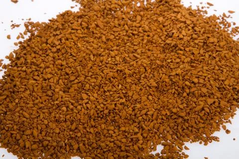 Coffee grains on the white Fotos de archivo