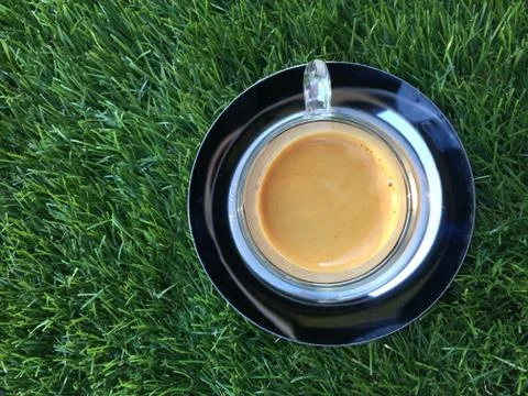 Coffee on the grass Stock Photos