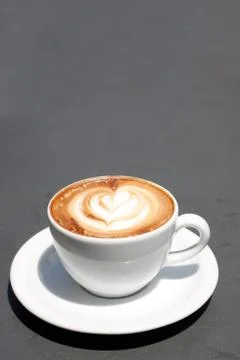 Coffee on gray surface Stock Photos