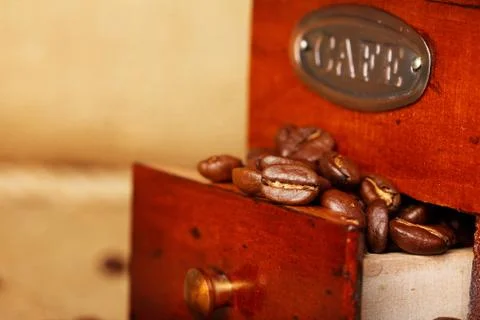 Coffee grinder with beans closeup Stock Photos