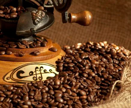 Coffee grinder with beans Stock Photos