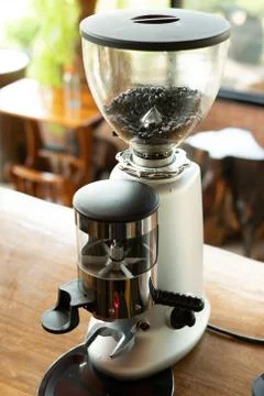 Coffee grinder in the cafe Stock Photos