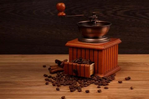 Coffee grinder with coffee beans Stock Photos