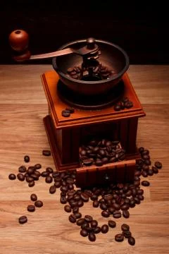 Coffee grinder with coffee beans Stock Photos